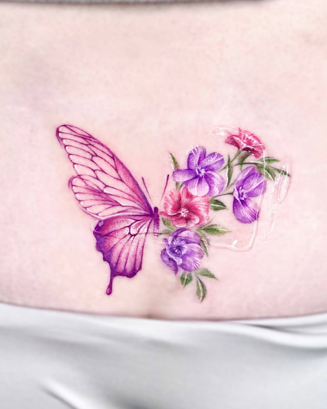 Tattoo by @sabeen.ink — fine_line, watercolor