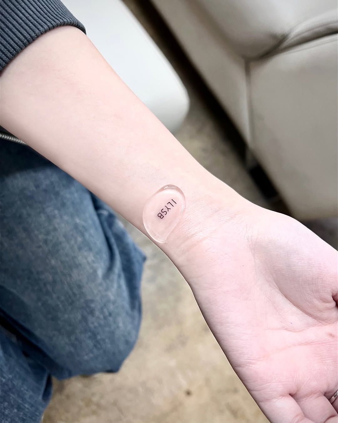 Tattoo by @sabeen.mini — lettering_script, fine_line