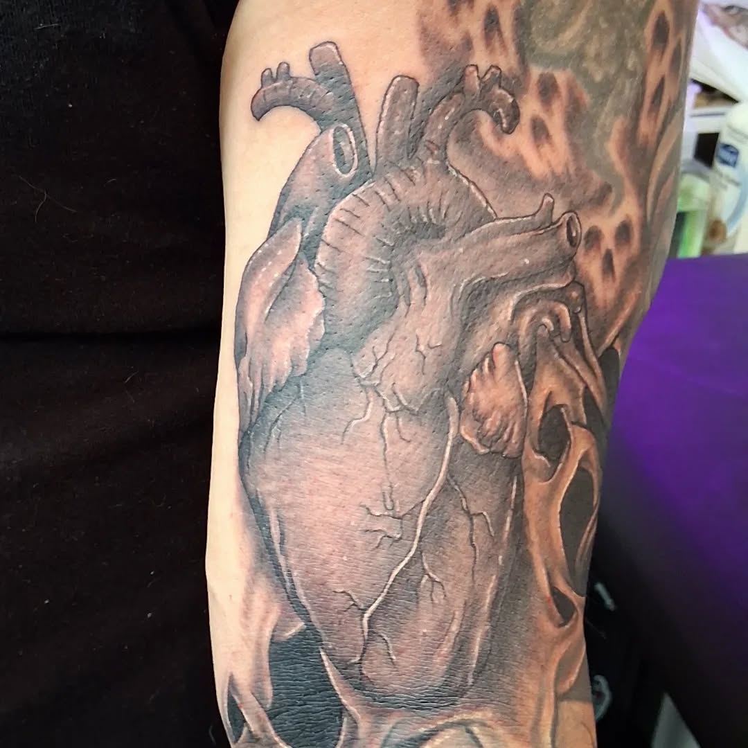 Tattoo by @tattoodaveatlivingcanvastattoo — realism, black_and_grey