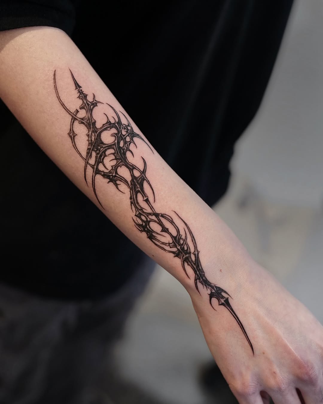 Tattoo by @gun_tattooist — blackwork, ornamental