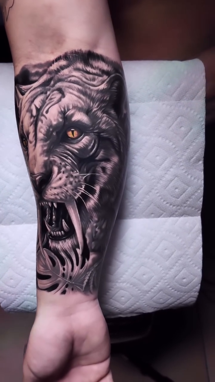 Tattoo by @juan_ortegatattoo — realism, black_and_grey