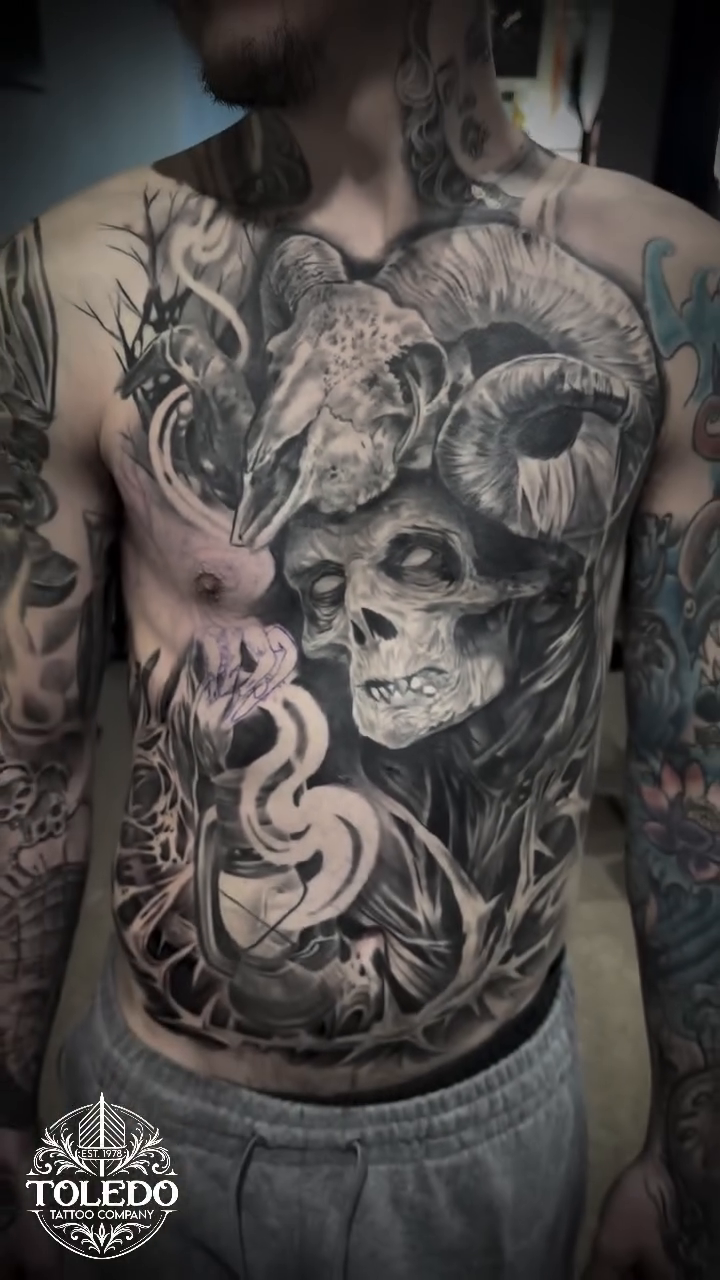 Tattoo by @kodiklotattoos — dark_realism, black_and_grey