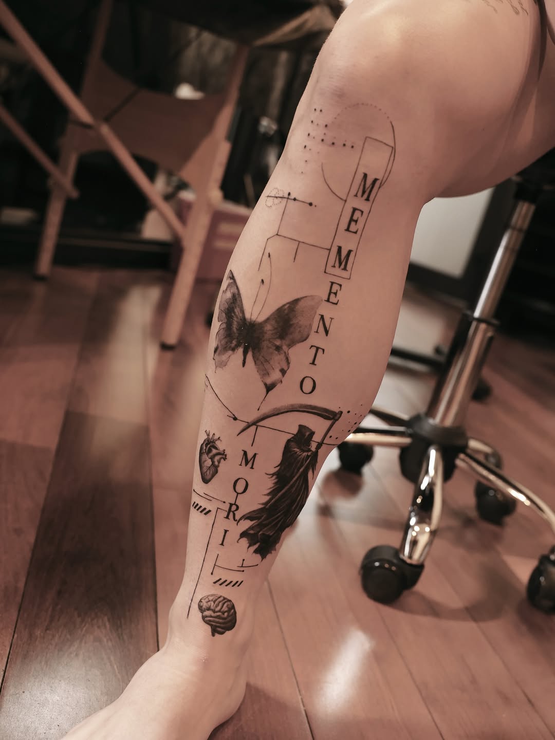 Tattoo by @iris.tatts — black_and_grey, realism