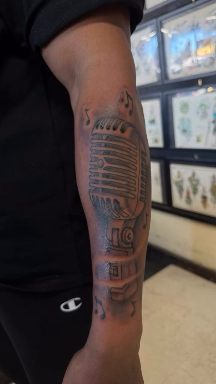 Tattoo by @tat2rikky — black_and_grey, realism