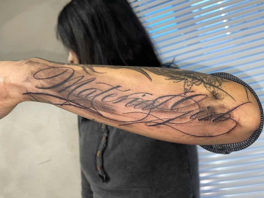 Tattoo by @eyeballism___ — lettering_script, black_and_grey