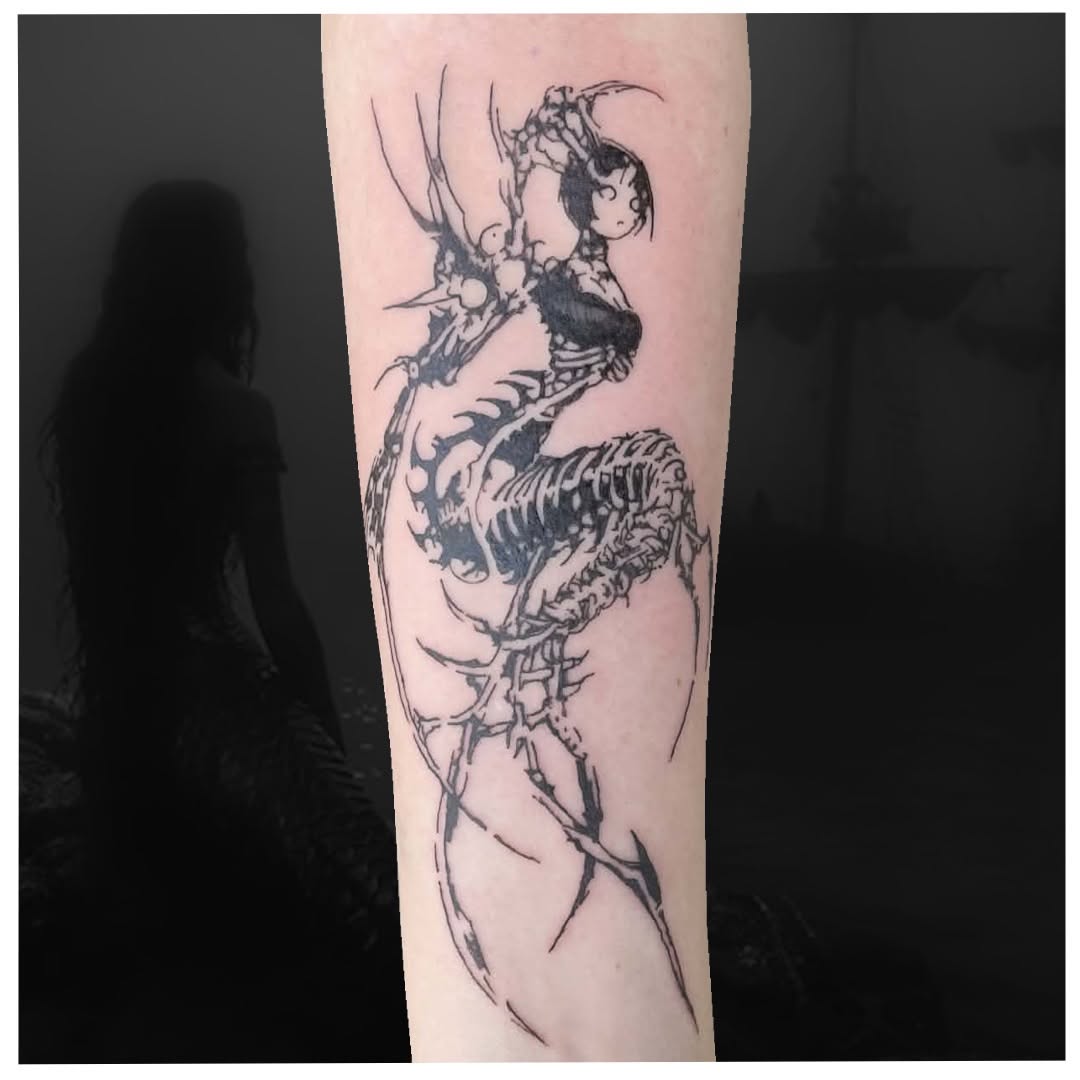 Tattoo by @cxt.ink — illustrative, blackwork