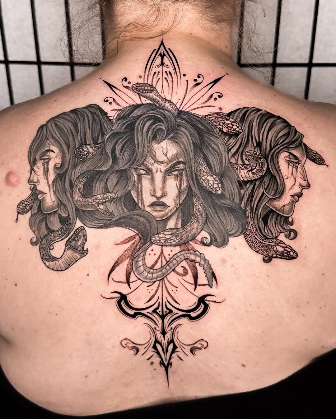 Tattoo by @2lulahtattoo — black_and_grey, dark_realism