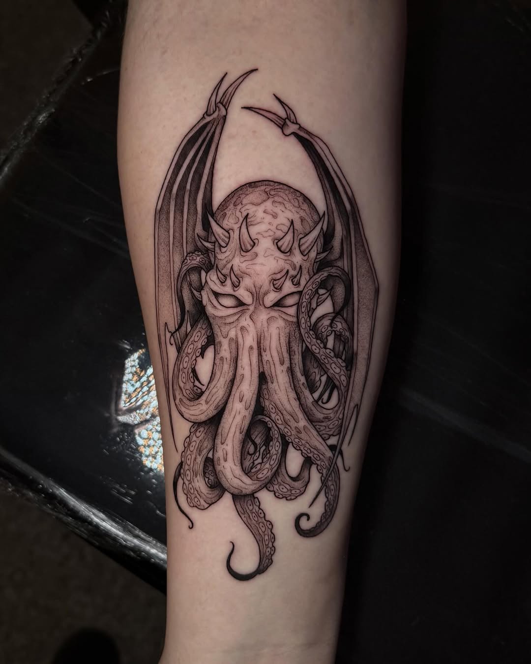 Tattoo by @lyssa_jtattoo — dark_realism, black_and_grey