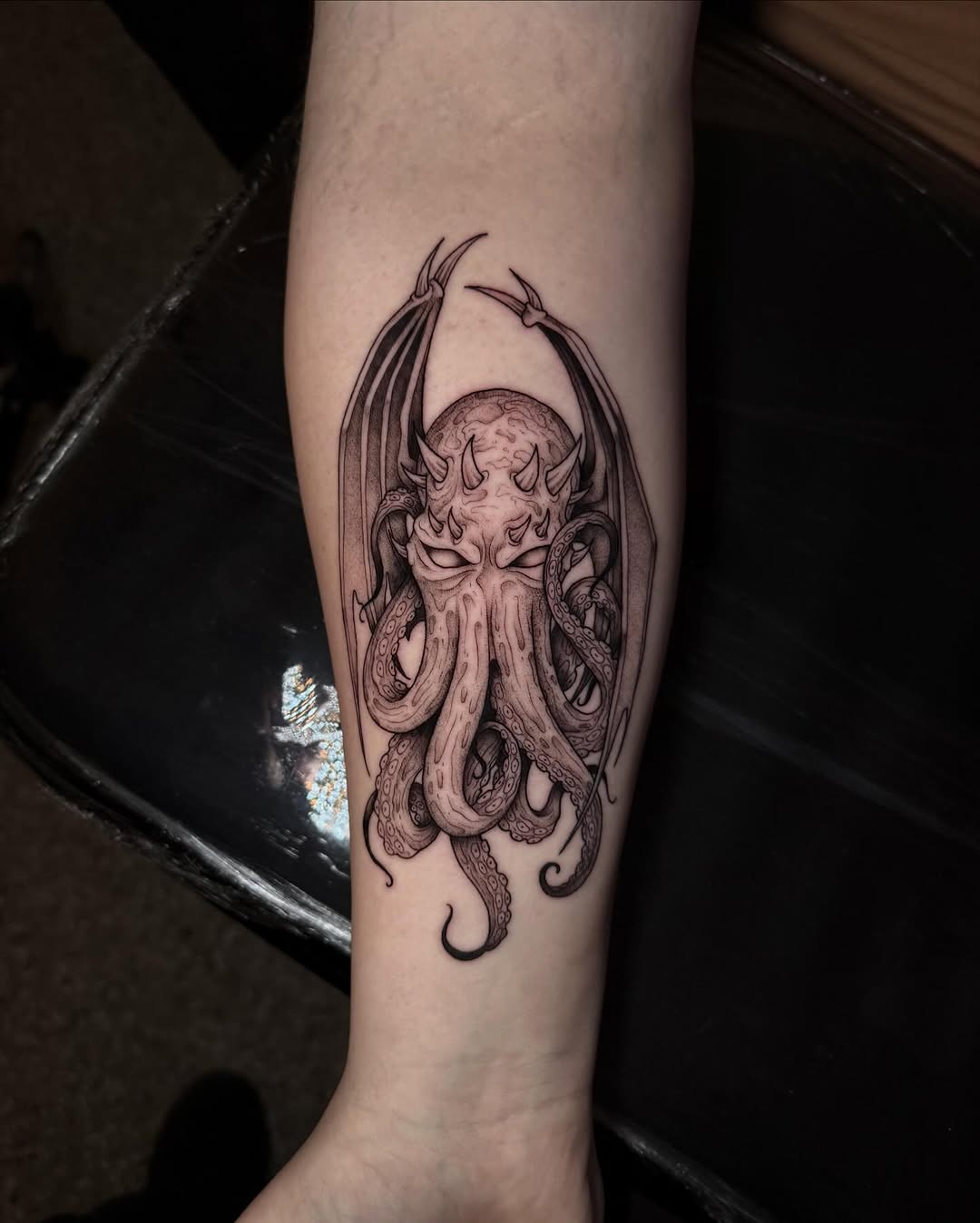 Tattoo by @lyssa_jtattoo — dark_realism, black_and_grey