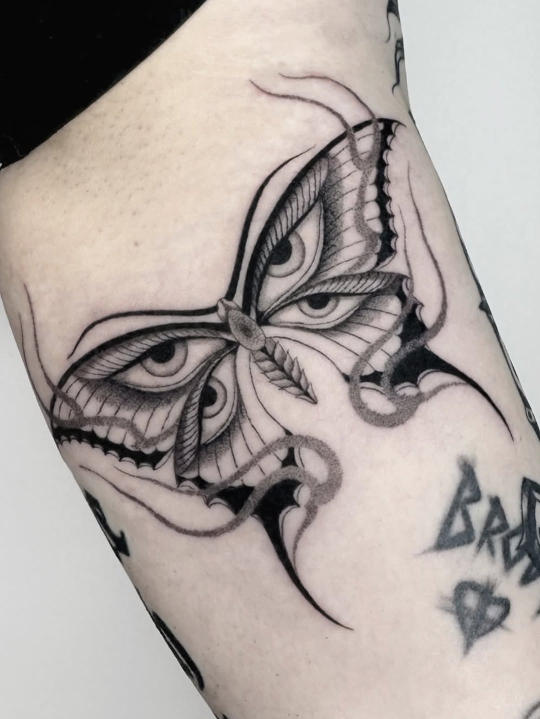 Tattoo by @grit.tattoo — black_and_grey, fine_line