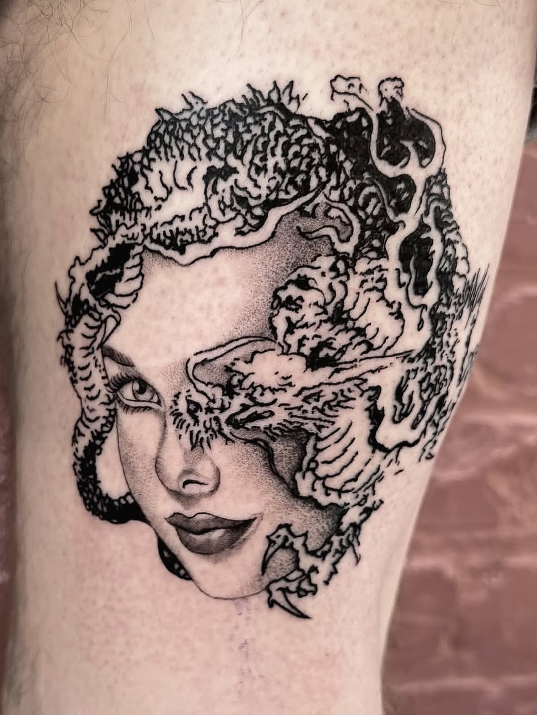 Tattoo by @grit.tattoo — black_and_grey, realism