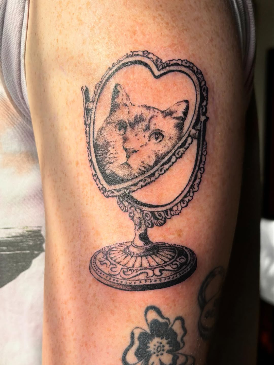 Tattoo by @kathleentattoos — realism, black_and_grey
