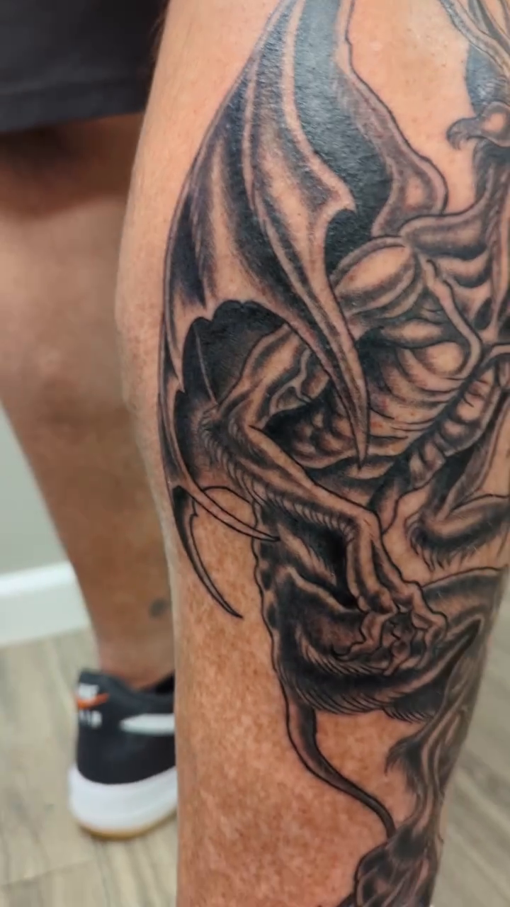 Tattoo by @rslegeltattoos — dark_realism, black_and_grey