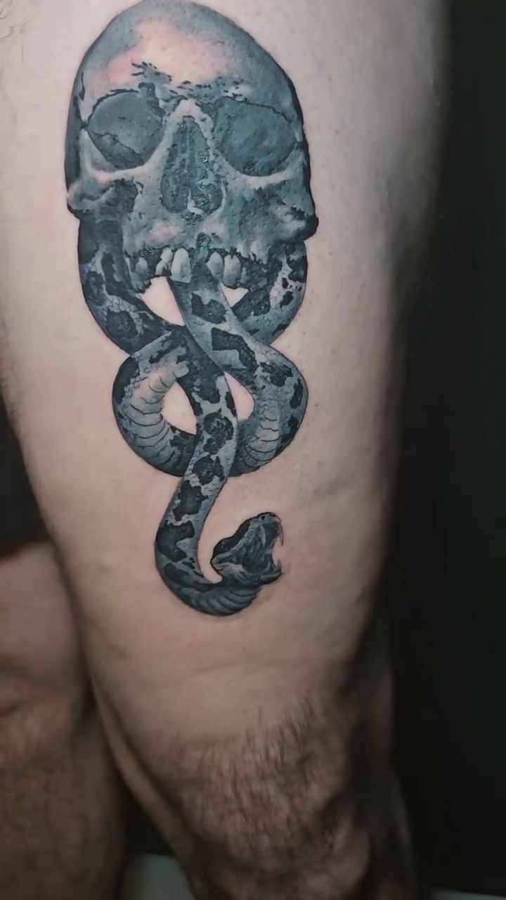 Tattoo by @johnniericotattoos — dark_realism, black_and_grey