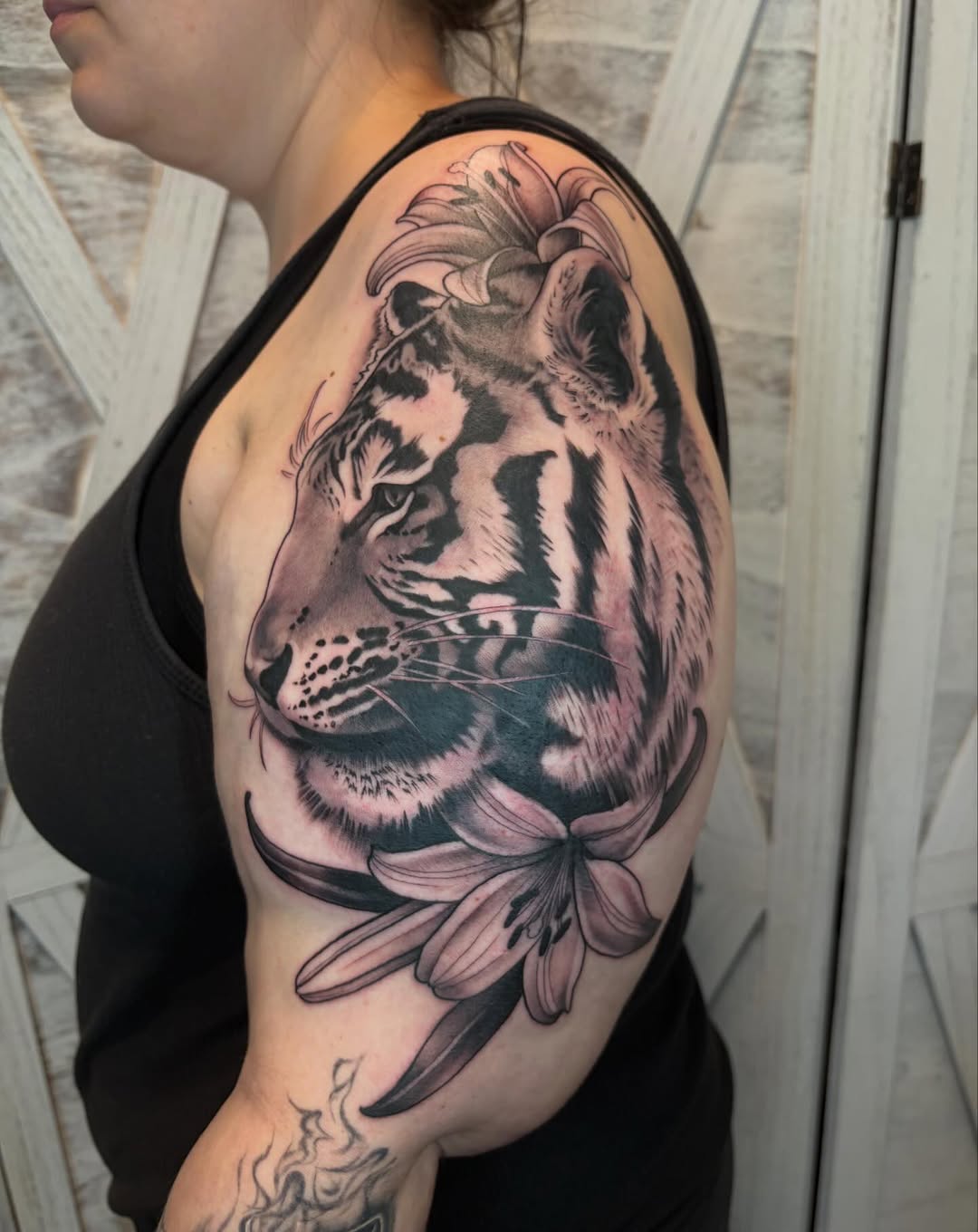 Tattoo by @black.thistle.tattoo — realism, black_and_grey