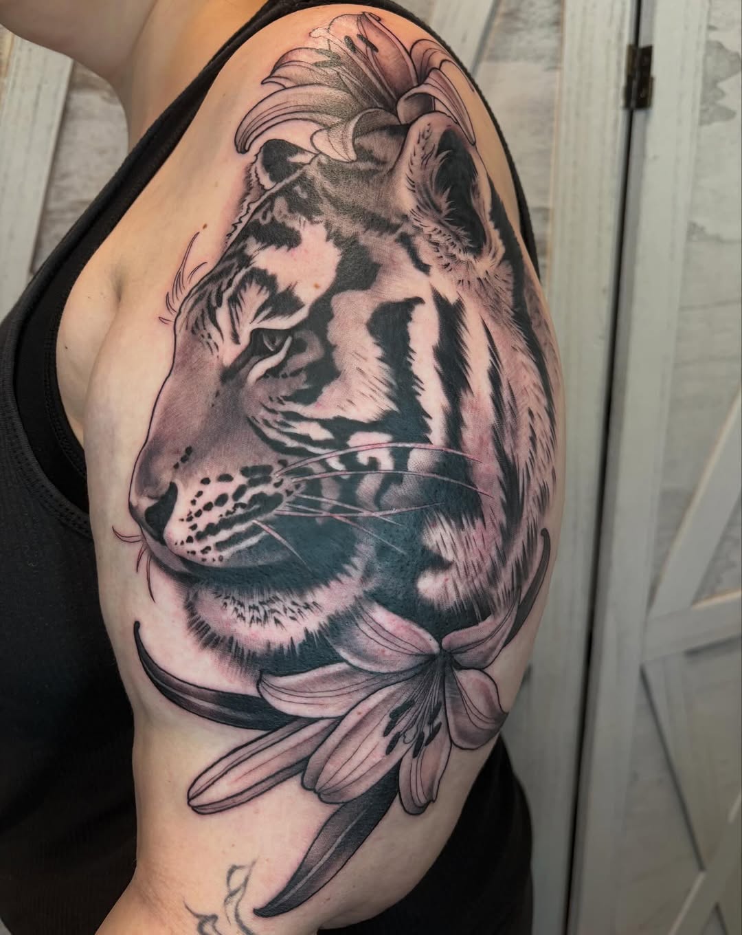 Tattoo by @black.thistle.tattoo — realism, black_and_grey