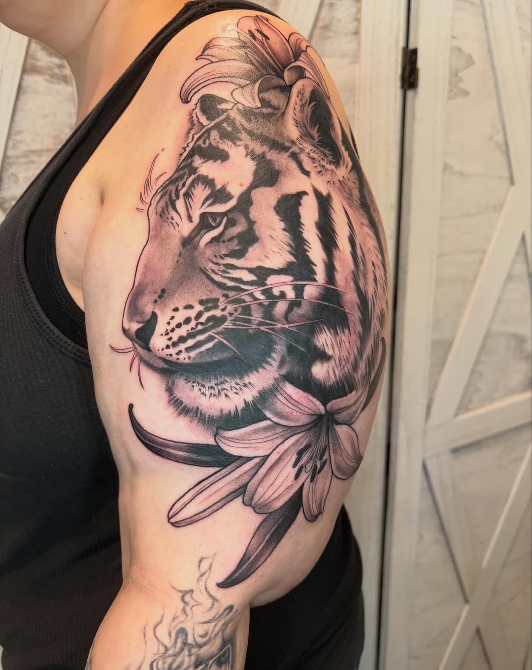 Tattoo by @black.thistle.tattoo — realism, black_and_grey