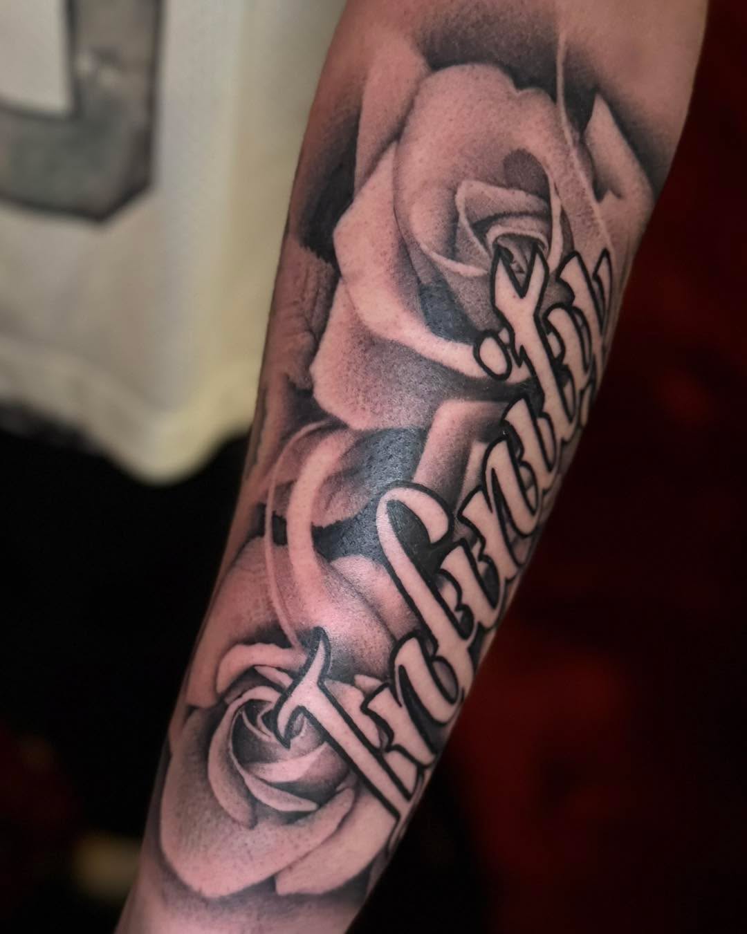 Tattoo by @_haloink_ — black_and_grey, lettering_script