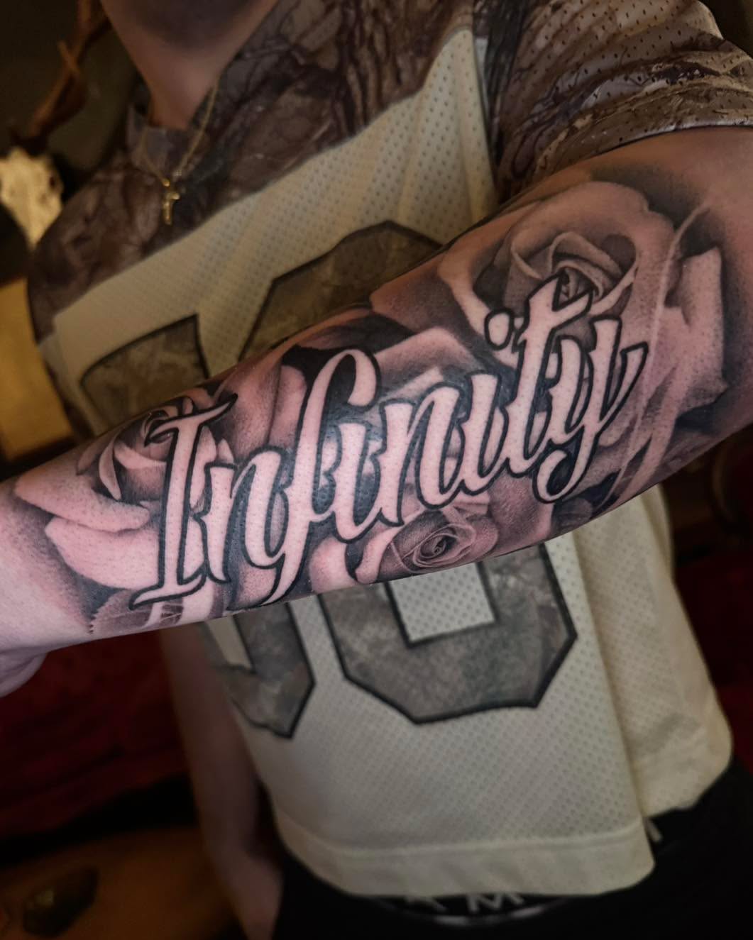 Tattoo by @_haloink_ — lettering_script, black_and_grey