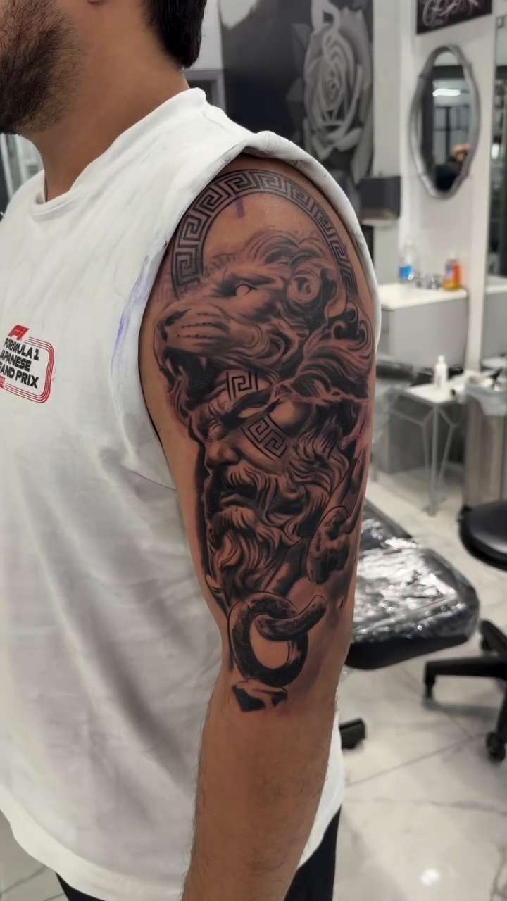 Tattoo by @inkedby.jf โ realism, black_and_grey