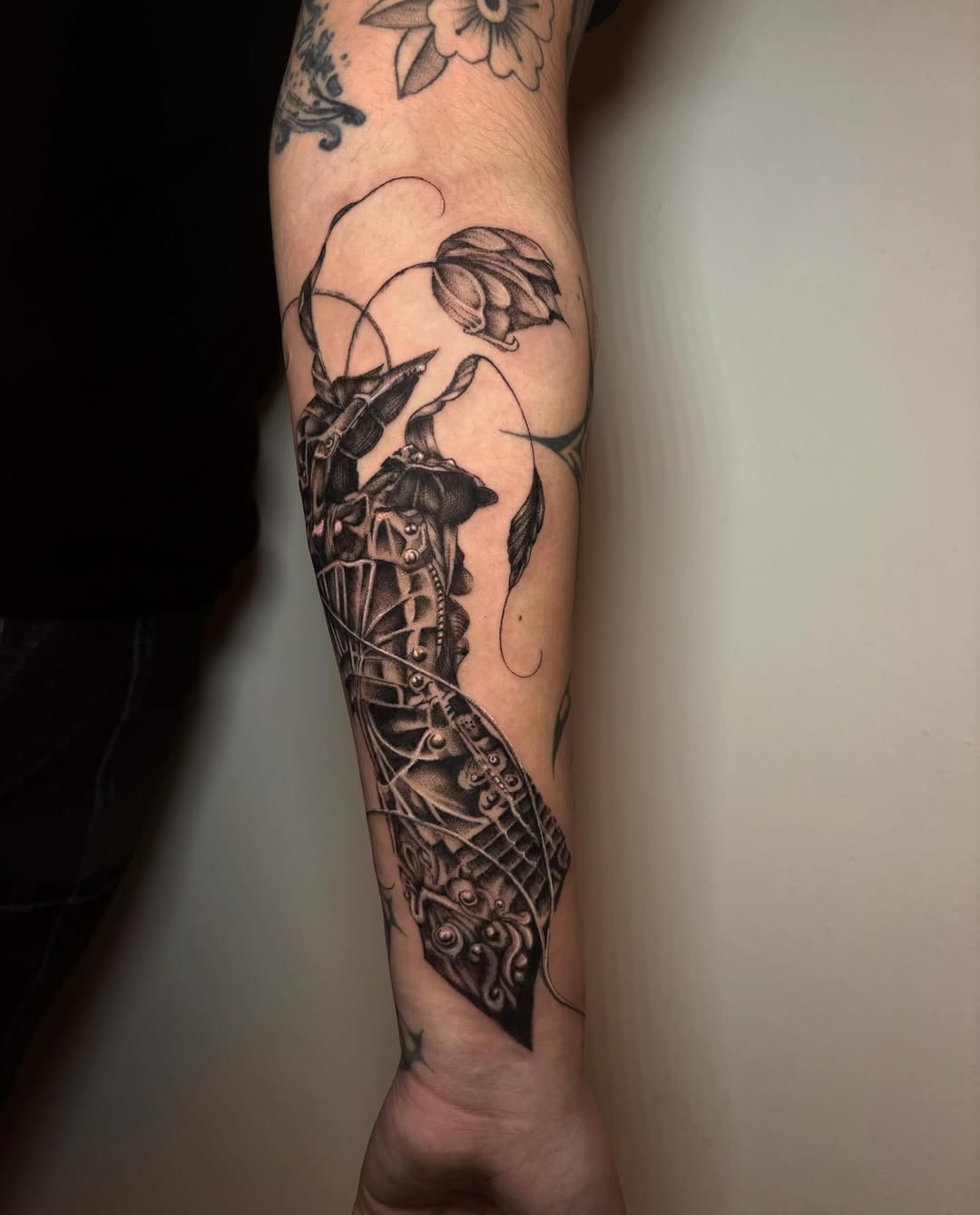Tattoo by @liz.tattooz — blackwork, illustrative
