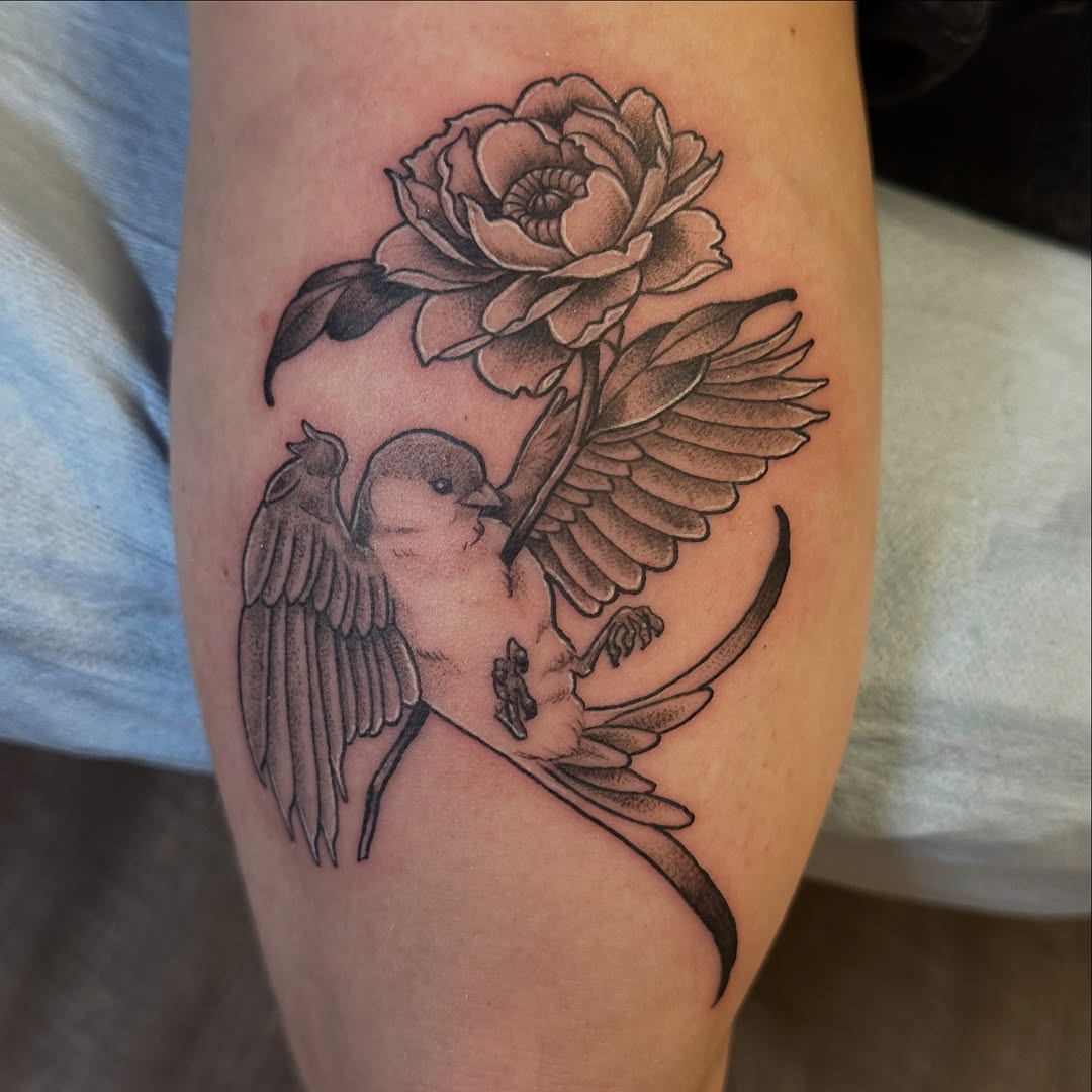 Tattoo by @kikis.inks — black_and_grey, realism