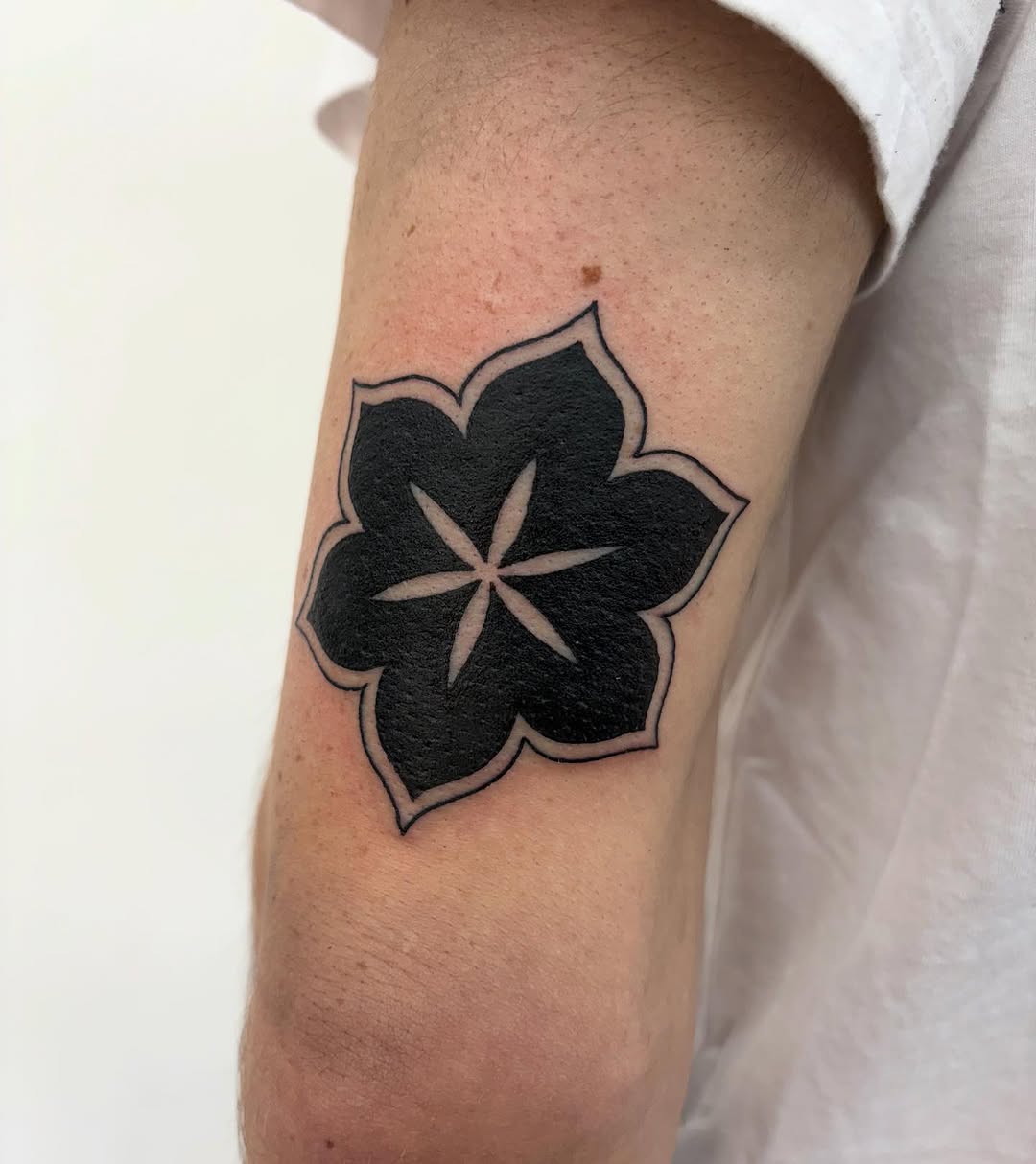 Tattoo by @slime.time.live — blackwork, geometric
