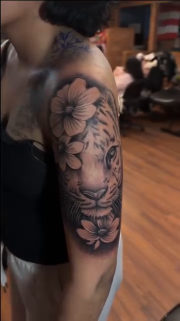 Tattoo by @tattoo_marvin23 — realism, black_and_grey
