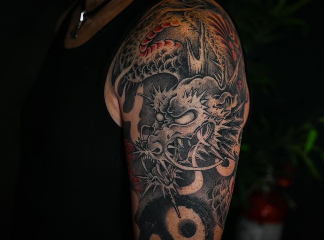Tattoo by @evian_tat โ japanese_irezumi, black_and_grey