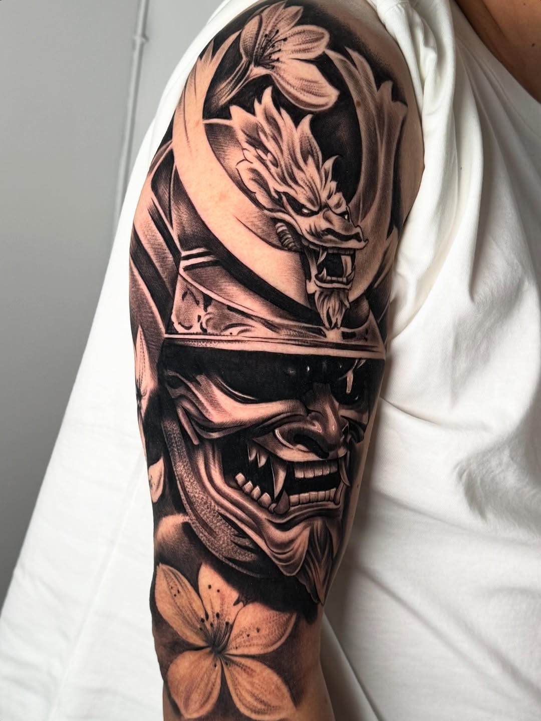Tattoo by @saeso___ — realism, black_and_grey