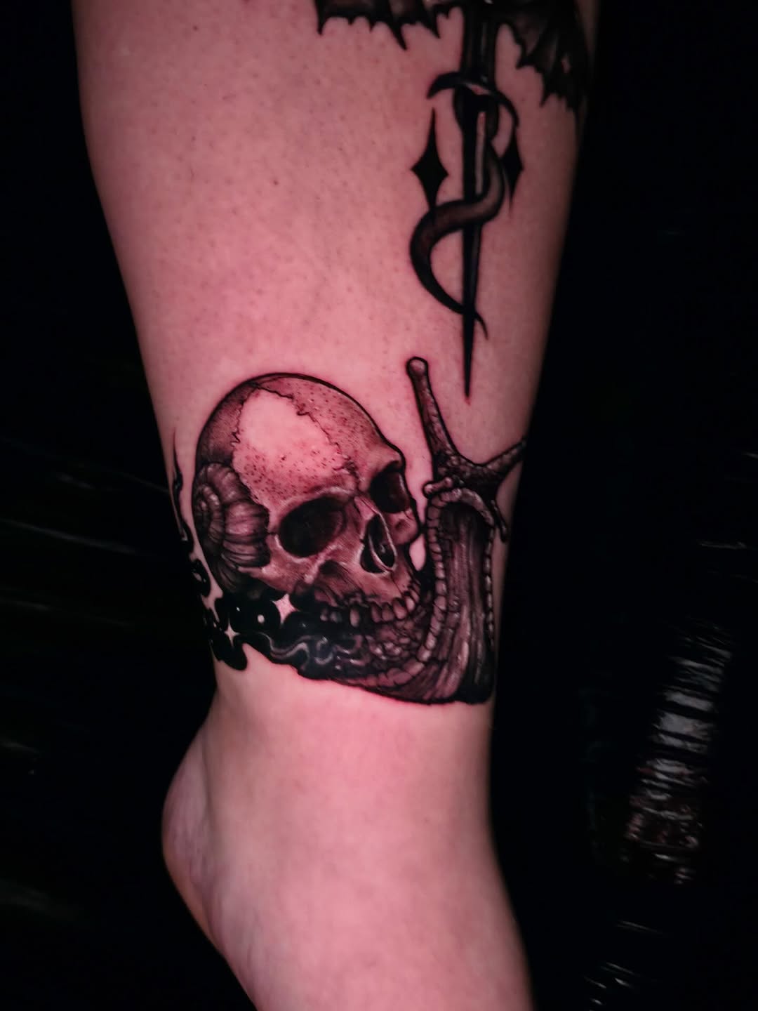 Tattoo by @tanktat2z — dark_realism, black_and_grey