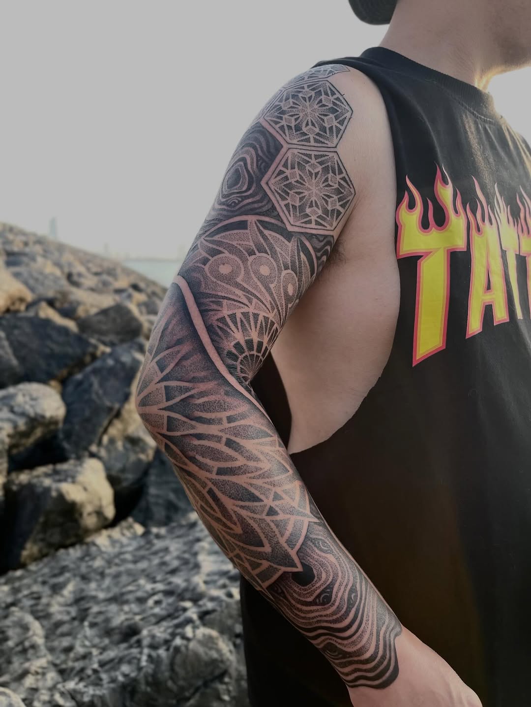 Tattoo by @russellefandialan โ geometric, dotwork