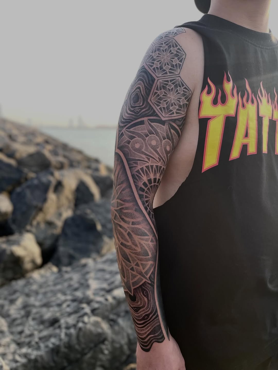 Tattoo by @russellefandialan โ geometric, dotwork