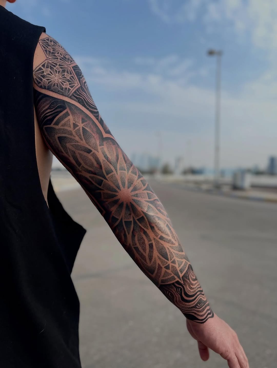 Tattoo by @russellefandialan โ geometric, dotwork