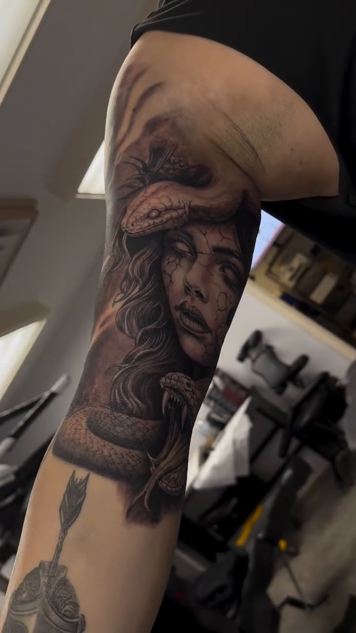 Tattoo by @jcgm_ink — realism, black_and_grey