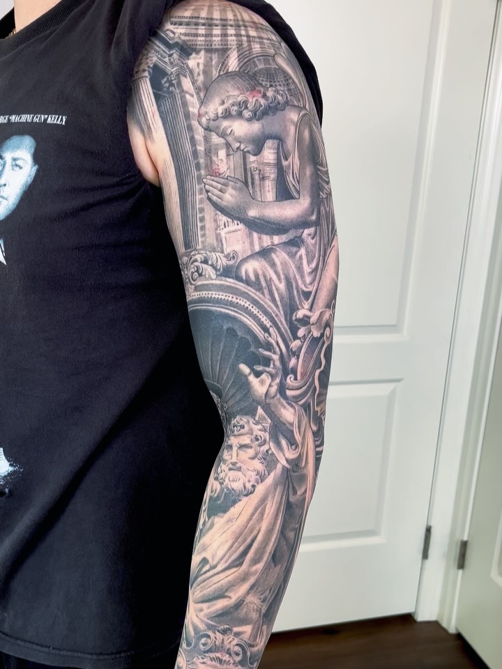 Tattoo by @carlos__macedo โ realism, black_and_grey
