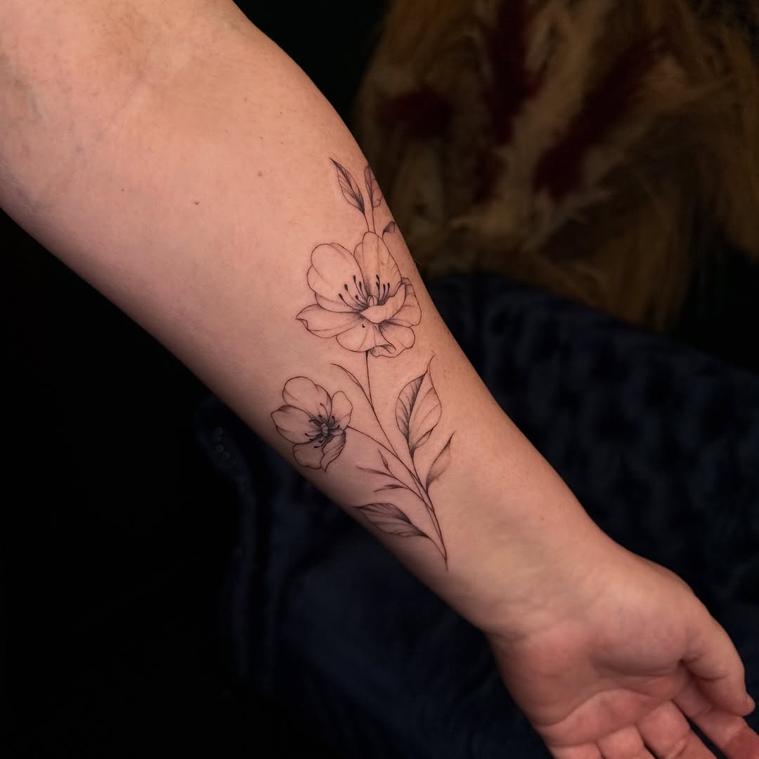 Tattoo by @lemon_headz.studio — fine_line, black_and_grey