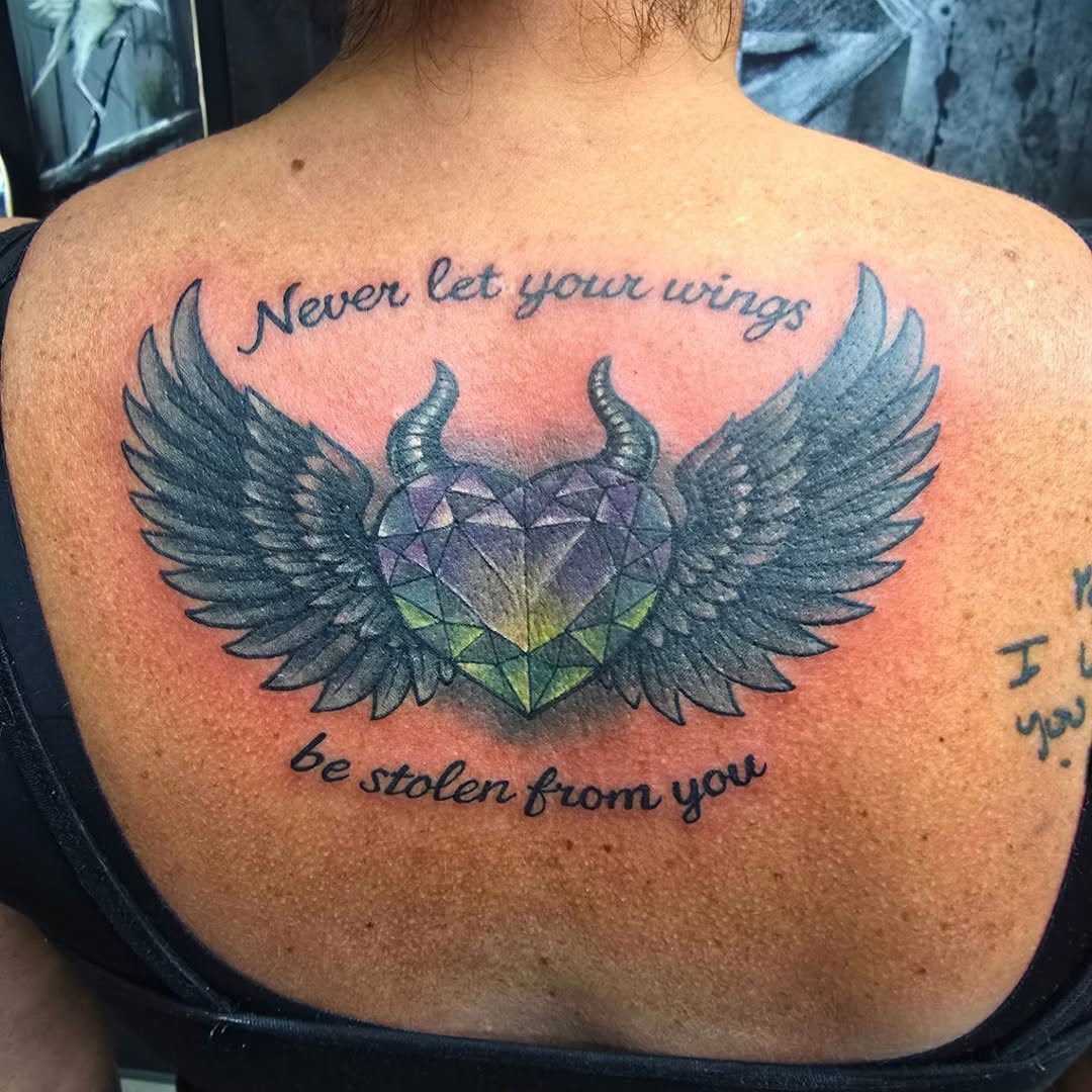 Tattoo by @david_winn_tattoos — lettering_script, realism