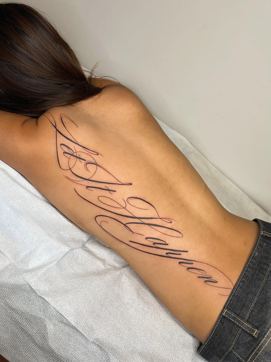 Tattoo by @robbwilsontattoos โ lettering_script, fine_line
