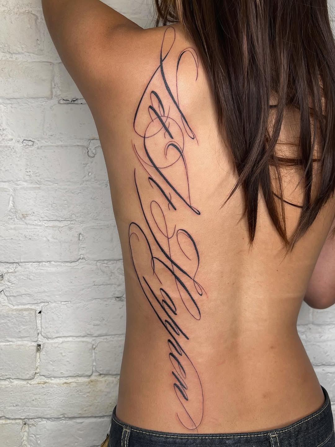 Tattoo by @robbwilsontattoos โ lettering_script, fine_line