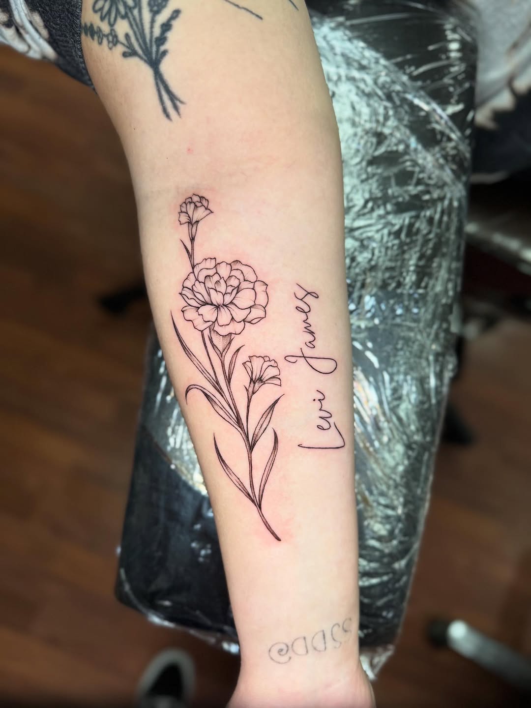 Tattoo by @mcurac.ink — fine_line, lettering_script