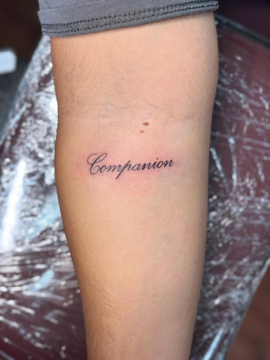 Tattoo by @mcurac.ink — lettering_script, fine_line