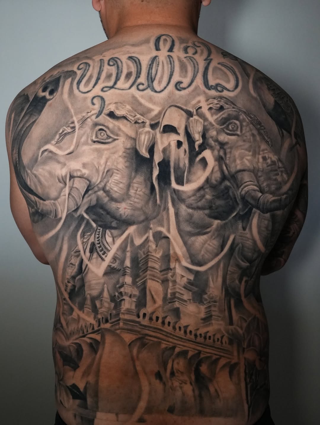 Tattoo by @nik__ink โ realism, black_and_grey