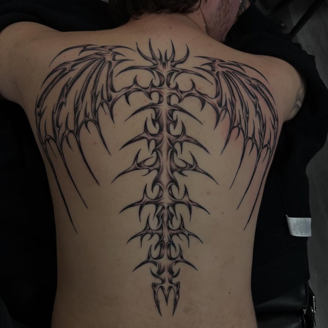 Tattoo by @goldenboysink — blackwork, tribal