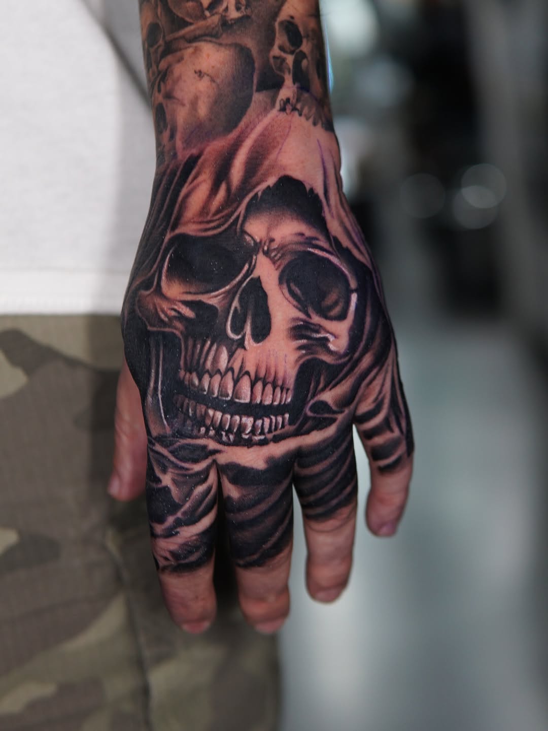 Tattoo by @tattoos.by.cristian — realism, black_and_grey