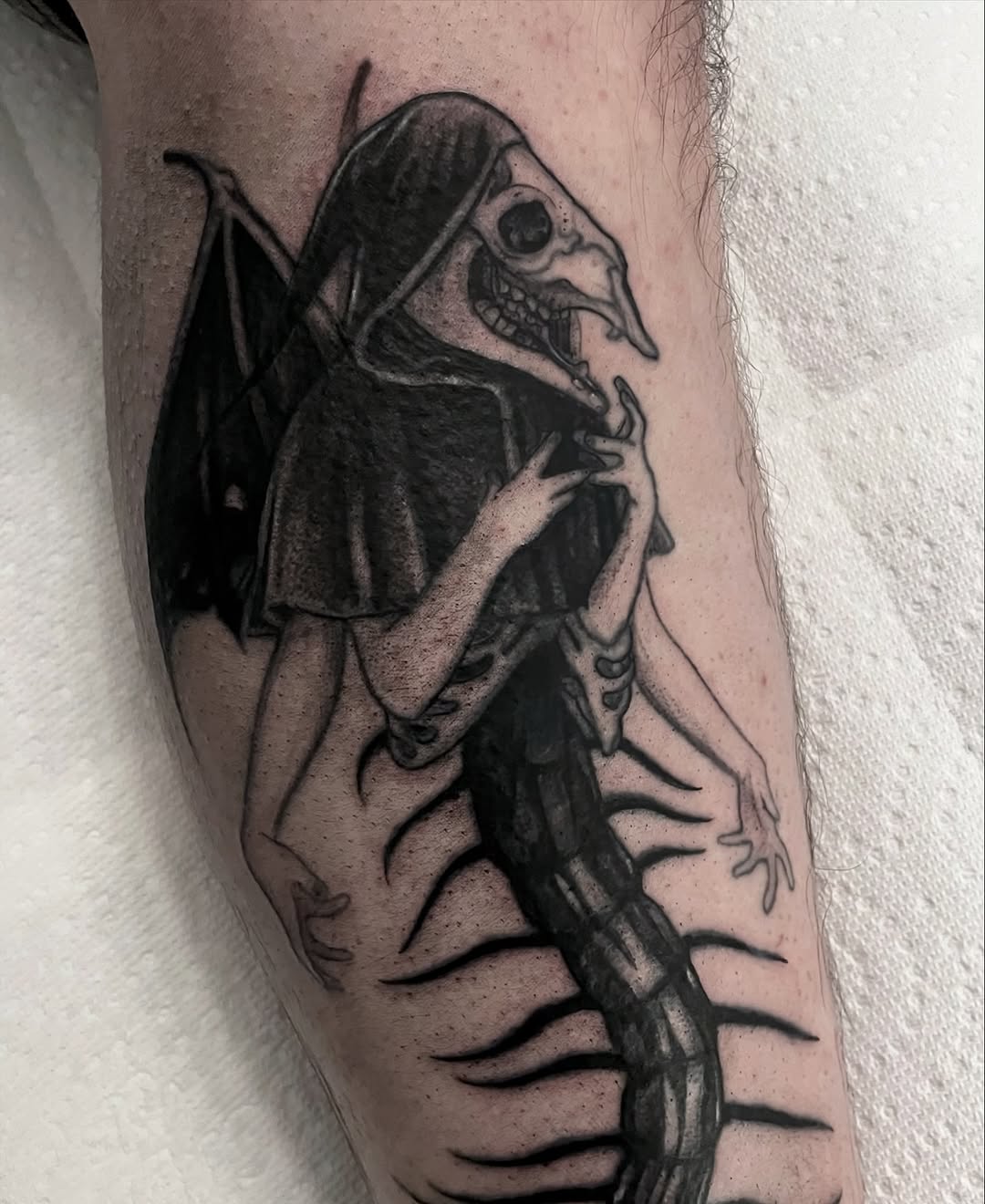 Tattoo by @ergot.tattoo — dark_realism, black_and_grey