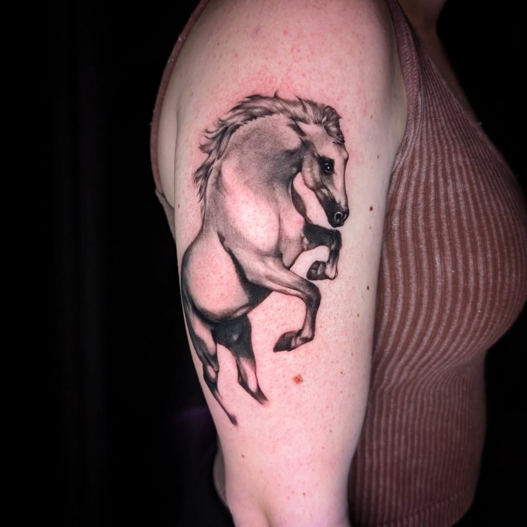 Tattoo by @estcoast โ realism, black_and_grey