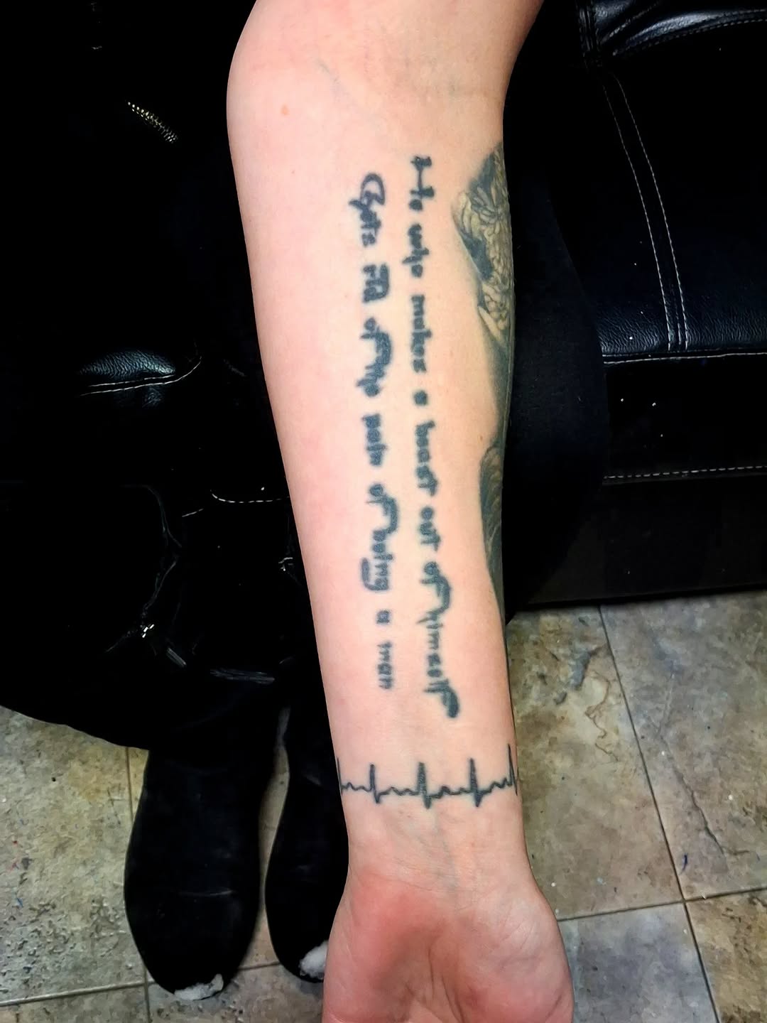 Tattoo by @an.inkredible.mind — lettering_script, black_and_grey