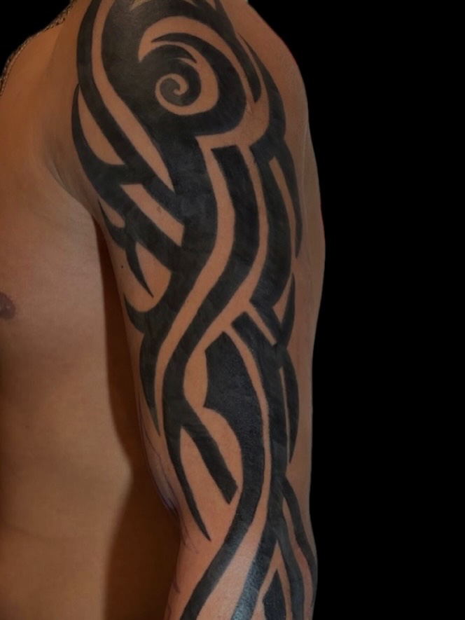 Tattoo by @tatsoul.byclaudia โ tribal, blackwork
