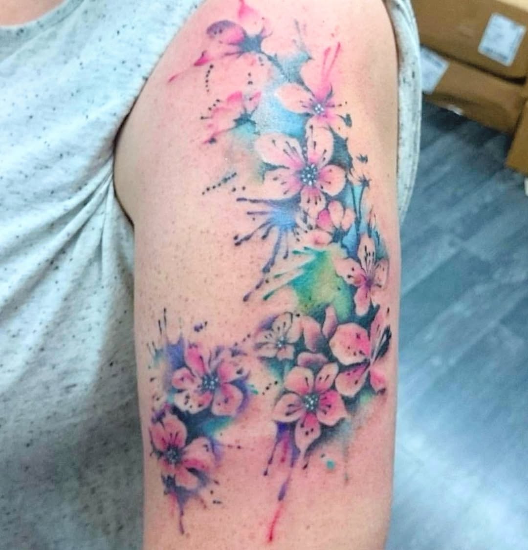 Tattoo by @savinggracetattoos — watercolor